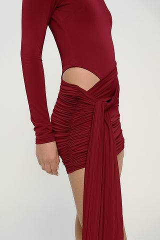 Khela Burgundy high neckline long sleeves with side cutout details draped mini dress