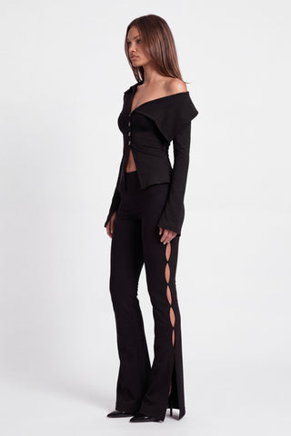 Khela Love Bites Top women's asymmetric top with a wide draped neckline, button details and long flared sleeves