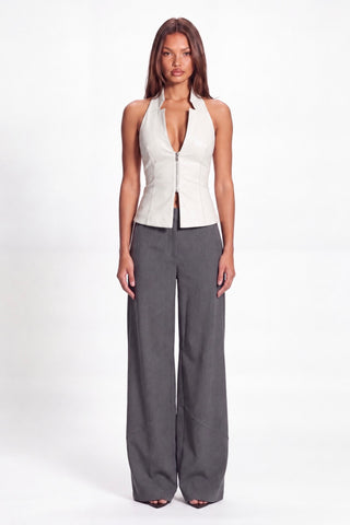 Khela Hard To Get Vest faux leather women's vest with a halter neckline, deep V-neck and front metal zipper