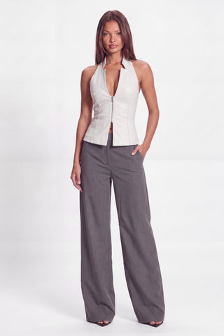 Khela Hard To Get Vest faux leather women's vest with a halter neckline, deep V-neck and front metal zipper