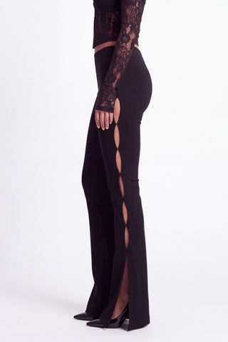Khela No Attachment Pants women's fitted stretch trousers with teardrop-shaped cut-out details along the legs