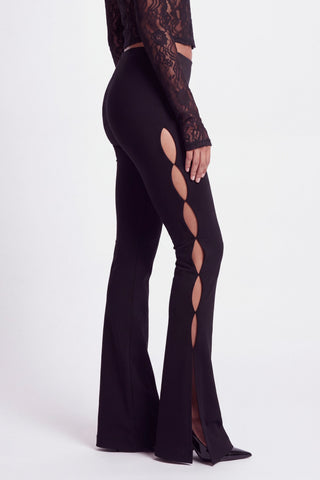 Khela No Attachment Pants women's fitted stretch trousers with teardrop-shaped cut-out details along the legs